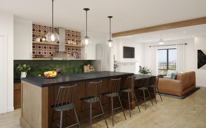 kitchen with a bar and chairs open to living room